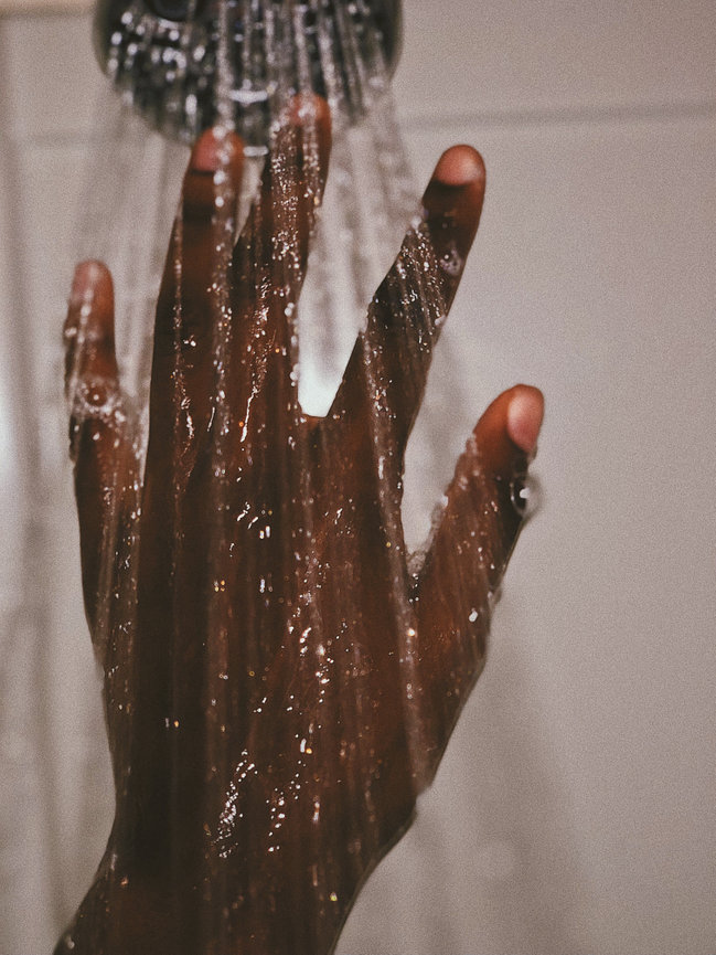 Hand in shower