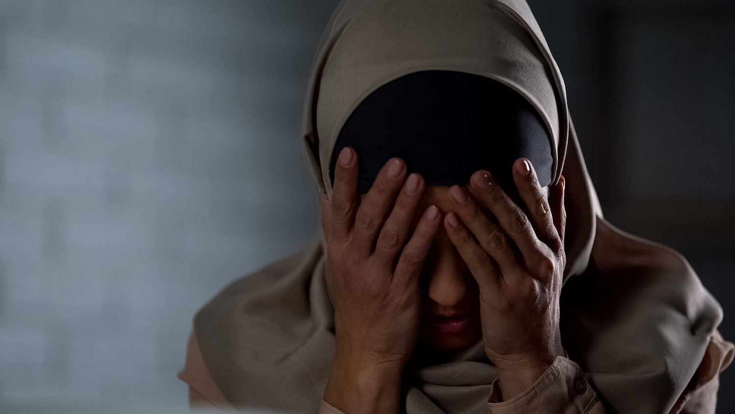 A close up of a woman hiding her head in her hands. A trauma therapist in Austin, TX can offer support in addressing trauma from the comfort of home. Learn more about online trauma therapy in Texas by contacting a sexual trauma therapist in Austin, TX today. 